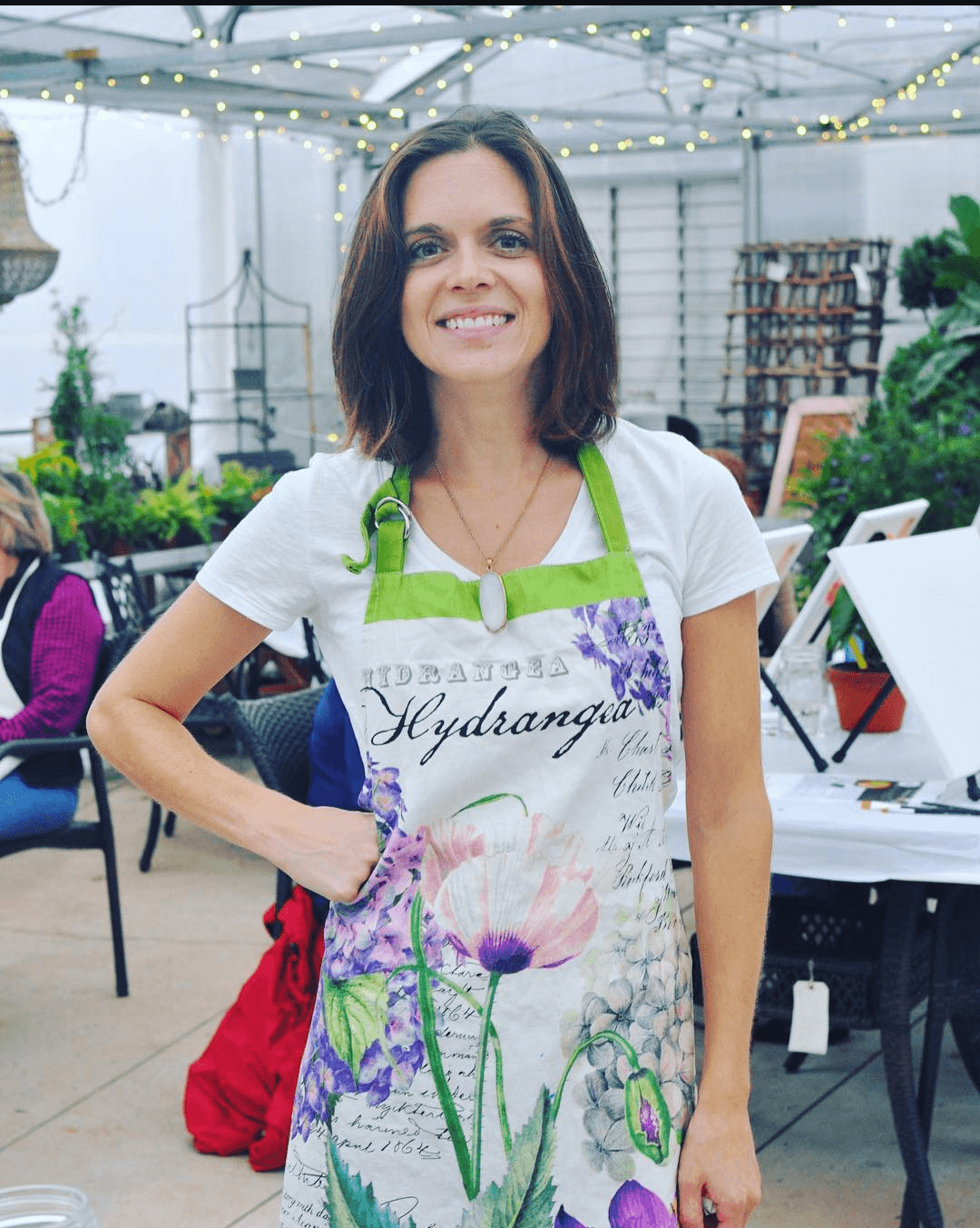 Anissa, painting teacher at an outdoor event